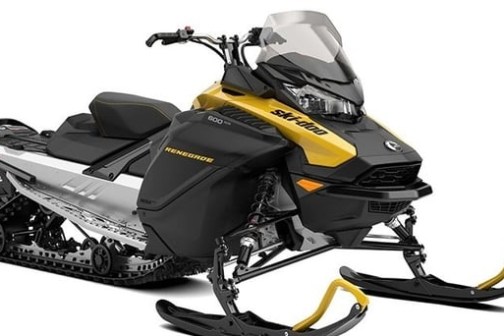 Black and yellow snowmobile with skis and tracks.