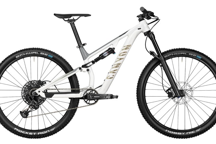 White full-suspension mountain bike with black tires and components.